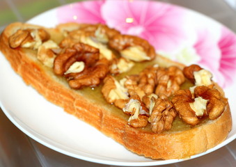 Sandwich with nuts and honey. Handmade dessert. Taste of childhood.