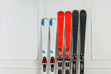 Winter ski with white wall background and free space for your decoration.