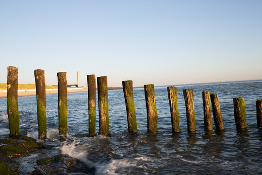 wave breakers on the North Sea in Zeeland on a sunny day