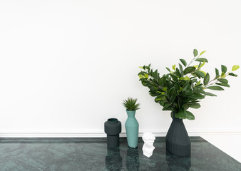 Composition of green plant in pot on marble top table with white background