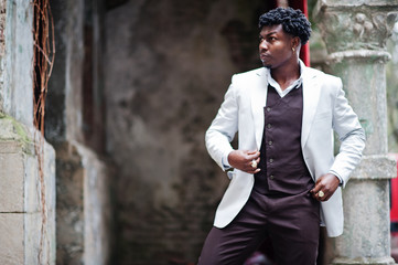 Thoughtful young handsome african american gentleman in formalwear. Black stylish model man in...