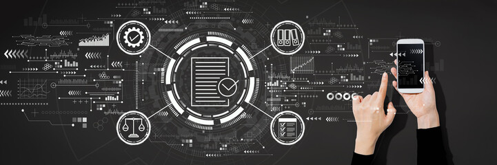 Compliance concept with person using a white smartphone