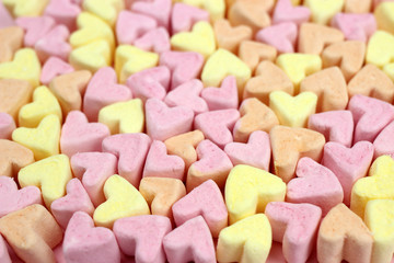 Pink and yellow marshmallows. Texture, background. The concept of Valentine's Day, lovers, wedding