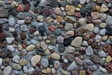 The texture of multi-colored stones. A lot of beautiful stones.