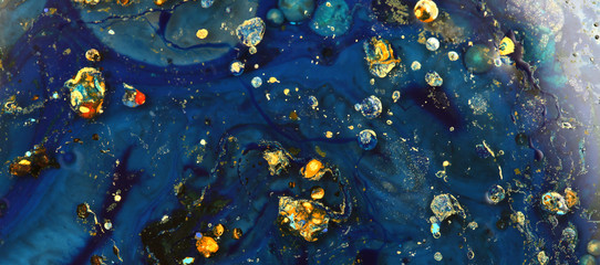 Macro mystical Abstract blue color marble texture background. Acrylic color in water and oil.