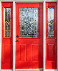 Fototapeta premium Close Up of a Red Door or Entrance to a House