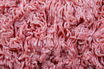 Full frame close up of raw fresh red and white minced meat pork and beef