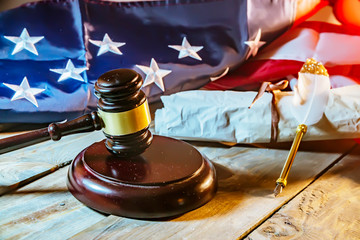 judge's hammer and the flag of America