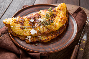 Irish Potato pancakes, latkes or boxty and sauces on wooden background