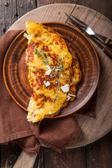 Irish Potato pancakes, latkes or boxty and sauces on wooden background