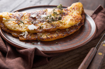 Irish Potato pancakes, latkes or boxty and sauces on wooden background