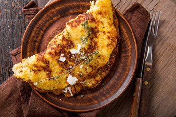 Irish Potato pancakes, latkes or boxty and sauces on wooden background