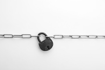 Steel padlock and chain isolated on white, top view. Safety concept