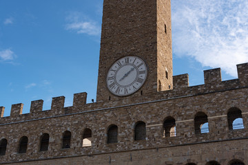 Fototapeta na wymiar view of the old building facade with bell tower in Florence Tuscany