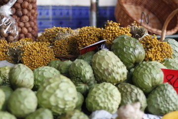 dried fruits and vegetables and chamomile on the market in funchal at madeira island