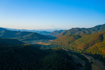 Fototapeta premium Aerial landscape of mountain and blue sky with cloud at Doi Mae U Kho, Khun Yuam, Mae Hong Son, Thailand