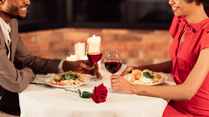 Black Spouses Having Romantic Date Eating In Restaurant, Panorama, Cropped