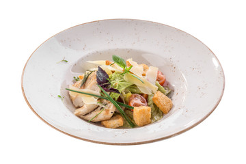 Healthy Grilled Chicken Caesar Salad with parmesan Cheese and Croutons isolated on white background