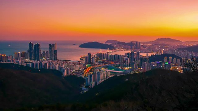 Timelapse video of Busan city with beautiful twilight sky, South Korea.