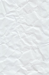 Crumpled paper. Seamless pattern with a white crumpled paper texture and stretched again.