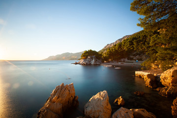 Scenic view of coast against sky during sunset, Brela, Croatia