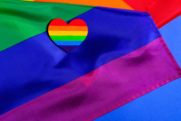 Mock-up made with the LGBT pride flag with the heart coloured in LGBTQ pride colours. Concept of the Valentine day, freedom, equality