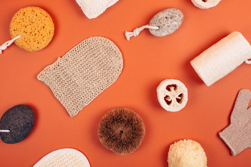 Fototapeta na wymiar Different types of zero waste sponges for body care. Concept of eco friendly supplies for self-care. Flat lay style.