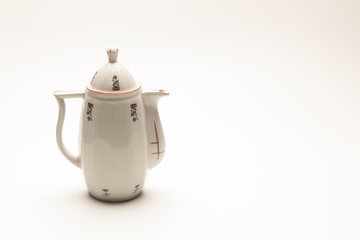 Classic vintage teapot or coffee maker for serving hot drinks