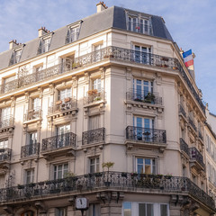 Fototapeta na wymiar Paris, typical facade and windows, beautiful building boulevard du Montparnasse