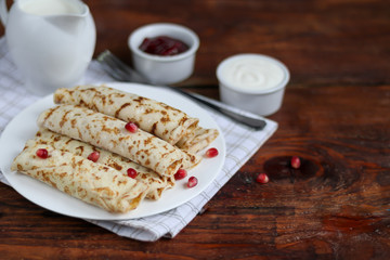 Pancakes with homemade cottage cheese. Sour-milk fermented product. Healthy, delicious breakfasts. With sour cream and raspberry jam.