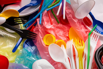 Colored single-use plastic and other plastic items