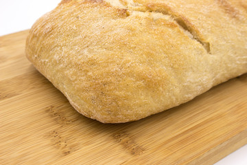 Chiabata bread bun closeup  on wooden background