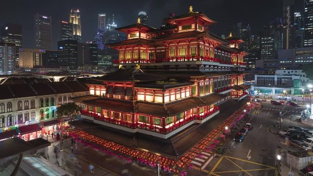 4K time lapse of Buddha Tooth Relic Temple at sunrise in China town, Singapore