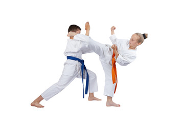 Athletes train blocks and kicks of karate © andreyfire
