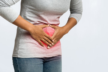 Cropped of black woman having menstrual abdominal pain