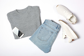 set of fashionable men's clothing and accessories on a white background top view.