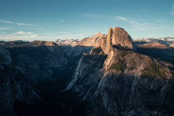 Last light of the day in the Yosemite Valley. Beautiful sunset over the Half Dome in one of the most gorgeous national parks of USA in California