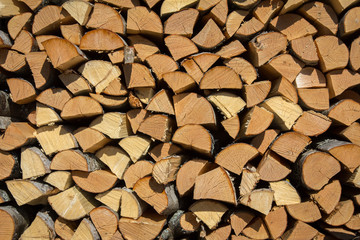 firewood stacked in a woodpile