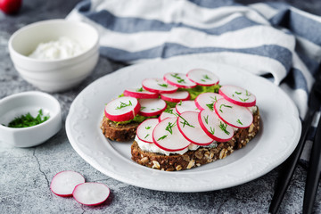 Radish avocado and ricotta avocado  rye sandwiches