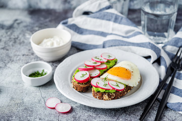 Radish avocado and ricotta avocado  rye sandwiches