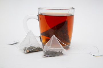 Tea bag. Tea in pyramid bags. Tea for quick use.