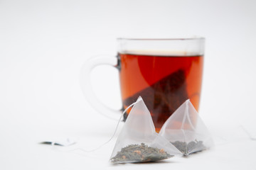 Tea bag. Tea in pyramid bags. Tea for quick use.