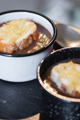French onion soup with cheese topped croutes
