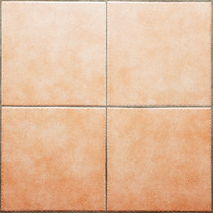 Beige-brown square shaped rustic style design ceramic floor flat tiles texture pattern background. Four tiles 2X2