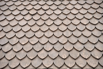Old wooden shingles on roof