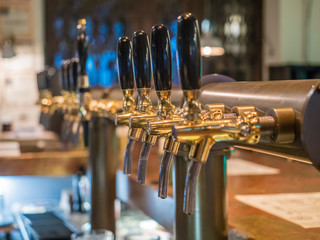 Taps for craft beer in a pub