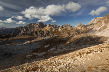Fototapeta na wymiar Autumn in Dolomites in Italy, Alpe di Siusi, Tre Cime.