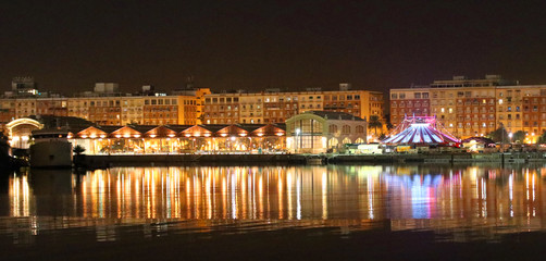 Valencia harbour view at night with circus tent