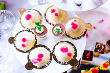 top view of delicious desserts at a wedding reception. candy bar