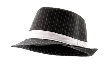 Chic hats and formal attire concept black pinstripe fedora hat isolated on white background with...